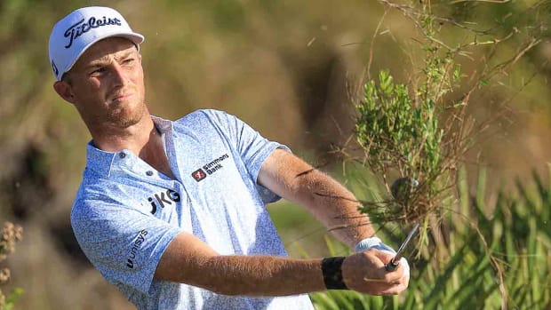 Will Zalatoris plays his second shot on the 18th hole during the third round of the 2023 Hero World Challenge at Albany Golf Course in Nassau, Bahamas.